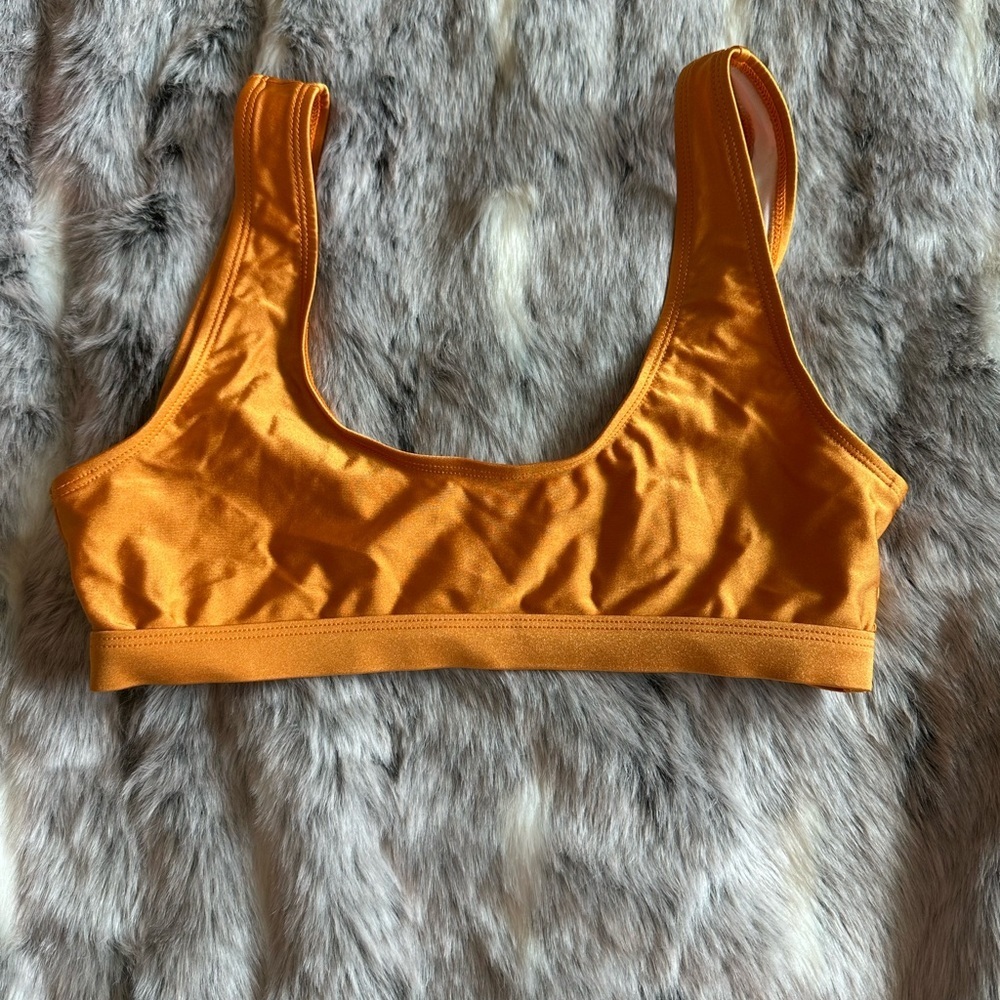 Dippin Daisy’s honey orange shiny bikini top sz Large